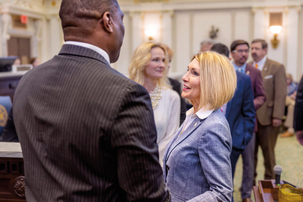 Representative Tammy West in conversation at the Oklahoma State Capitol